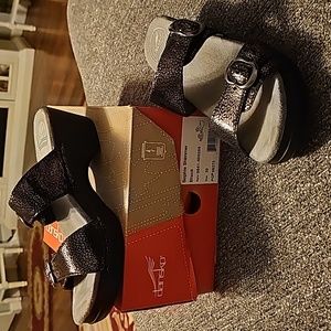 Dansko black shimmer size 8 sandals.